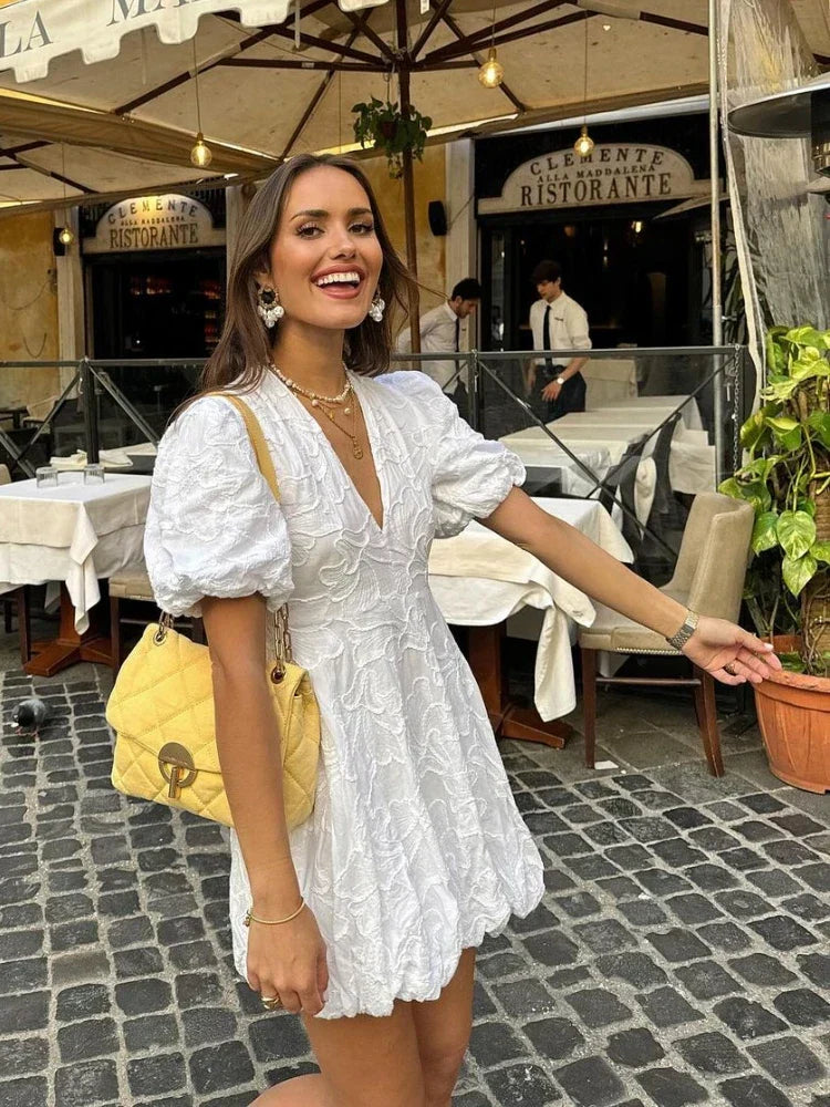 Tessa – Romantische midi-jurk met pofmouwen