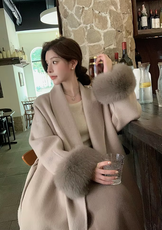 Noémie - Luxe mantel met ceintuur en elegante pasvorm