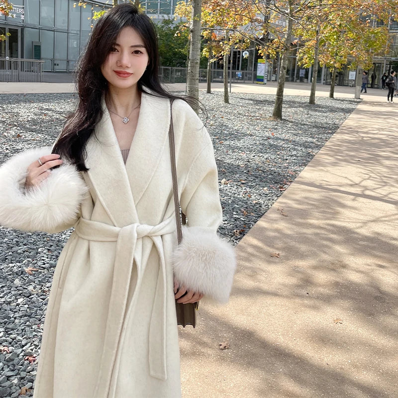 Noémie - Luxe mantel met ceintuur en elegante pasvorm